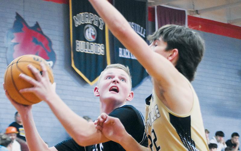 Robbinsville’s Micah York was the Black Knights’ leading scorer in Jan. 12’s season wrap-up: the semifinals of the divisional tournament, which was contested against Hayesville. Photos by Kevin Hensley/sports@grahamstar.com