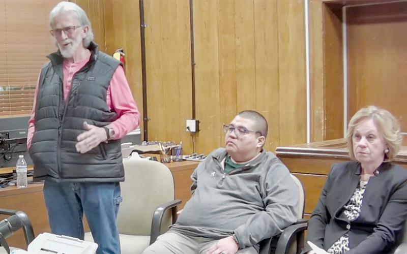 Commission candidate Dale Wiggins (left) delivers his closing statement at Saturday’s forum. Sitting alongside Wiggins are candidates Brian “Taco” Johnson (center) and Carolyn Stewart. Stills courtesy of The Graham Star's YouTube