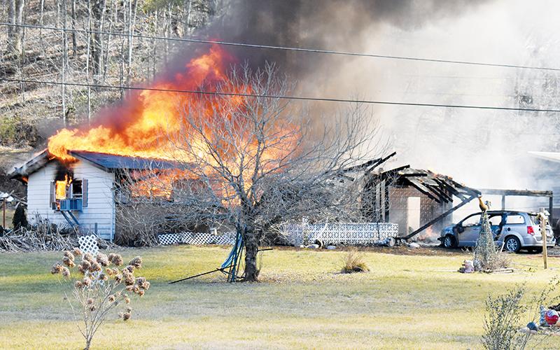 The home of Jim and Lela Hyde erupted in flames Feb. 12. Firefighters were unable to save the residence. Photo by Kevin Hensley/editor@grahamstar.com