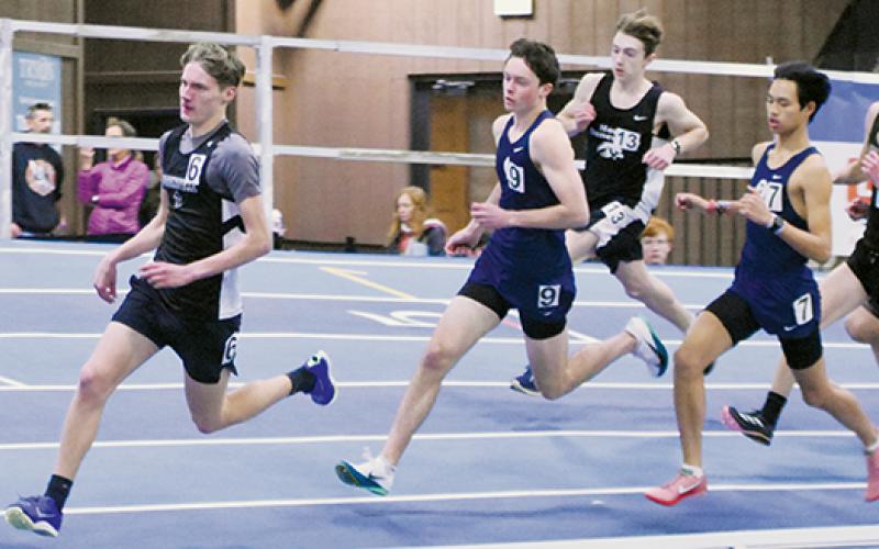 Robbinsville's Nathan Frederick leads a pack of runners during the 1,000-meter run at Jan. 28's meet in Mill Spring. Photos by Kevin Hensley/sports@grahamstar.com