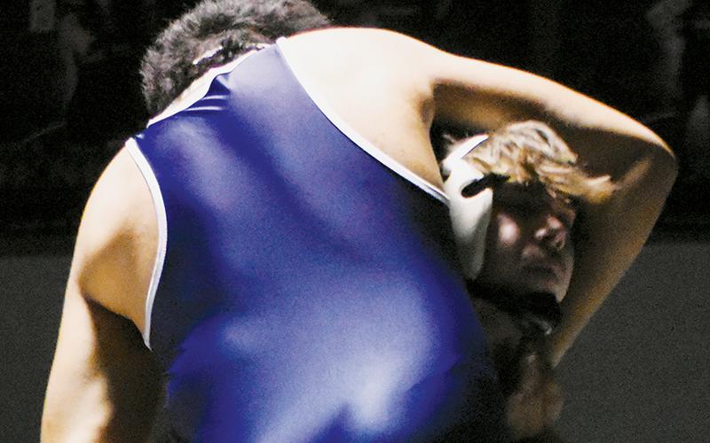 Brayden Lane manhandles Bonnie Cone Leadership Academy's Achilles Ochoa during the second round of the dual-team postseason Tuesday. Photo by Kevin Hensley/sports@grahamstar.com