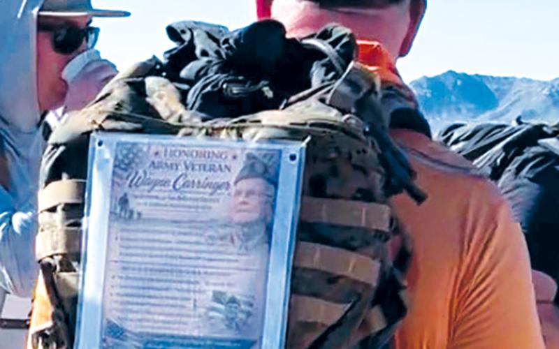Former Graham County resident Greg Barker was not interested in the spotlight when he participated in the Bataan Memorial Death March last month. Instead, he wanted to honor the legacy of World War II veteran Wayne Carringer – and did so by wearing an information-filled placard on his pack throughout the marathon.