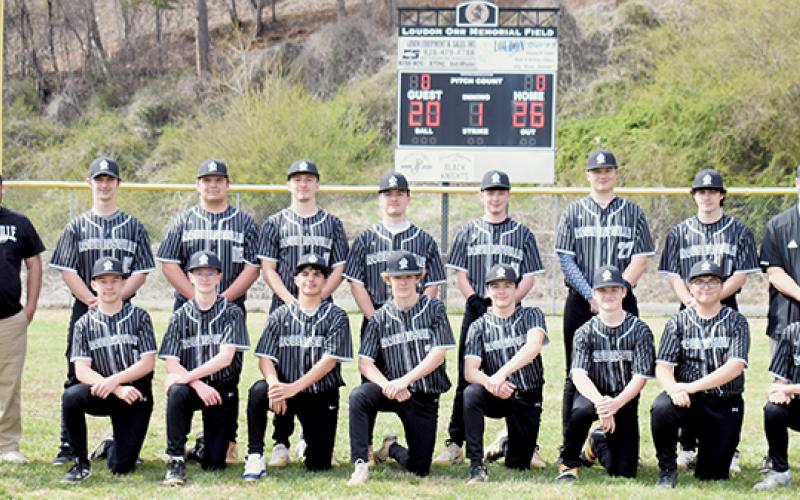 The 2026 Robbinsville Black Knights. Names are listed from left in both rows. Kneeling in front: Jackson Lane, Ayden Farley, Xamuel Wachacha, Benton Gibby, Ayden Conley, Tegan Werner, Deacon Hyde and Joshua  Satterfield. Standing: assistant coach Ethan Orr, head coach Thomas Menard, Zander Davis, Rylen Orr, Luke Lovin, Easton Shuler, Everett Taylor, Peyton Brooks, Evan Menard, and assistant coaches Adam Brooks and A.J. Conley. Photo by Kevin Hensley/sports@grahamstar.com