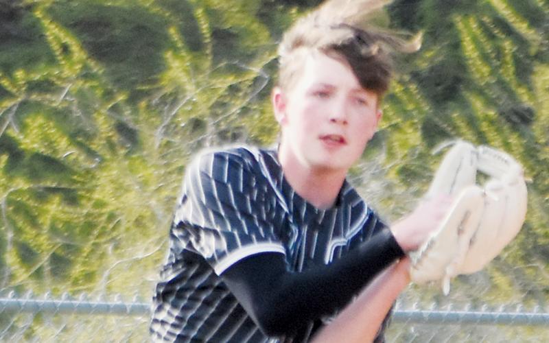 Everett Taylor makes a running catch March 20 against Andrews. Photo by Kevin Hensley/sports@grahamstar.com