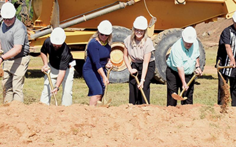 Officials from across Graham County participate in the ceremonial groundbreaking of the new Robbinsville Elementary School on July 1. Photo by Kevin Hensley/editor@grahamstar.com