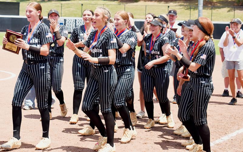 The Robbinsville Lady Knights cheer after being announced as the 1A state champions May 30. The team was recently named one of the Top 25 in the nation. Photo by Kevin Hensley/editor@grahamstar.com