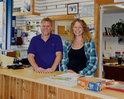 Jim Suprinski (left) and Diana Cole-Joerns moved from Illinois to live their dream of owning their own business. The couple now owns The Boat & Auto Shop on Tallulah Road. Photo by Art Miller/amiller@grahamstar.com