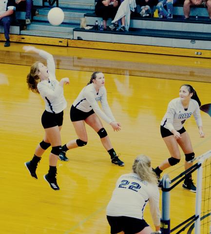 Surrounded by teammates Karlyn Matheson, Kennedy Cable (4) and Karcee Dooley (22), Lady Knights sophomore Halee Anderson prepares to spike the ball during Tuesday’s sweep against Andrews. Now 12-1 on the year, Robbinsville has moved into the No. 1 state ranking for all 1A schools. Photo by Kevin Hensley/editor@grahamstar.com