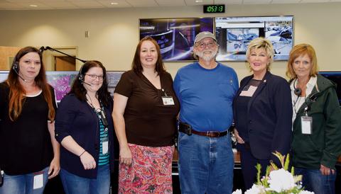 Robbinsville – The Graham County Communications Center came alive Friday when the center threw open its doors to community members.  	The new center’s first open house offered tours of the facility, as well as refreshments and opportunities to meet the folks who make the center work. 	The state-of-the-art, grant-funded facility opened last November and is the most secure building in Graham County. 	 The 4,000 square-foot structure is tornado-proof and designed to keep operations running in any conditions.