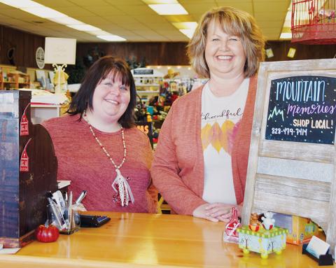 Cynthia Garren (left) and Lavetta Roper greet customers every time they walk into Mountain Memories. Photo by Art Miller/amiller@grahamstar.com