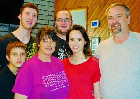 The Burchfield family, together once again. Standing in front are Jake, Donna, Gracie and Junior. In back are T.J. (left) and Lance. Photos by Art Miller/amiller@grahamstar.com