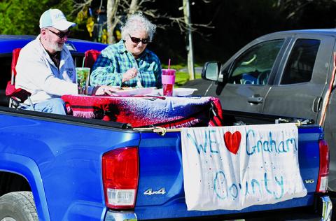 Rick and Joyce Mitchell found a creative way to enjoy their drive-in meal at  Stecoah Diner on April 2. Photos by Kevin Hensley/editor@grahamstar.com