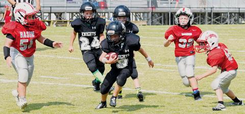 Robbinsville Termite Black Knight Braylon Phillips weaves through the Copper Basin, Tenn., defense during a Sept. 28, 2019 showdown. The Smokey Mountain Youth Conference announced the cancelation of the 2020 football and cheerleading seasons on June 16. Photo courtesy of Jenny Millsaps