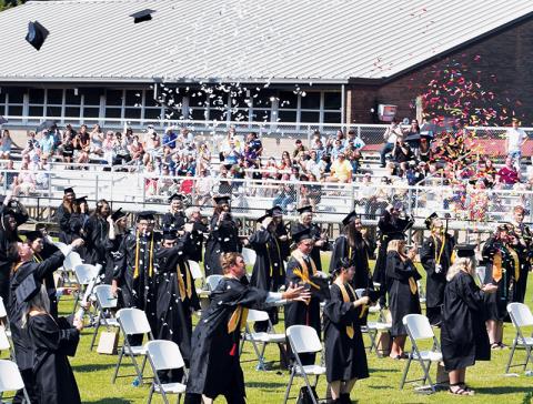 Time to celebrate! The Robbinsville High School Class of 2020 kicks off a victory party at the conclusion of Saturday’s commencement. Photo by Art Miller/amiller@grahamstar.com
