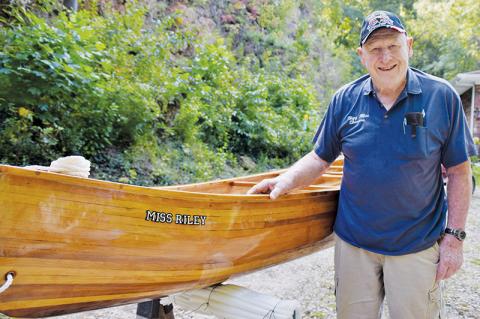 Sweetgum resident George Poerner spent the last year building this 14-foot canoe. The 86-year-old veteran plans to launch the craft in Graham County waters soon. Photo by Art Miller/amiller@grahamstar.com