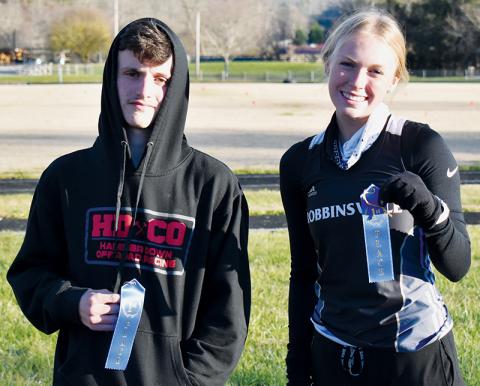 Robbinsville’s Hayden Stewart (left) and Ava Barlow won the respective boys and girls varsity races at the Currahee Classic on Dec. 2. Photo by Kevin Hensley/editor@grahamstar.com