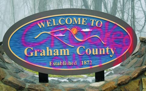 Graham County officials are still working to gather intel on who is responsible for vandalizing the new “Welcome to Graham County” sign near the U.S. 74 intersection in Topton over the holiday weekend. Photo by Charlie Benton/news@grahamstar.com