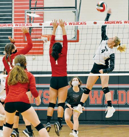 Kensley Phillips shows off her vertical prowess while rising for the kill Monday at Andrews. Photos by Kevin Hensley/editor@grahamstar.com