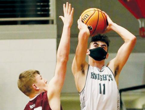 Jeb Shuler puts up a first-half jumper against Swain County on Friday. Photo by Miranda Buchanan/Robbinsville High School Yearbook