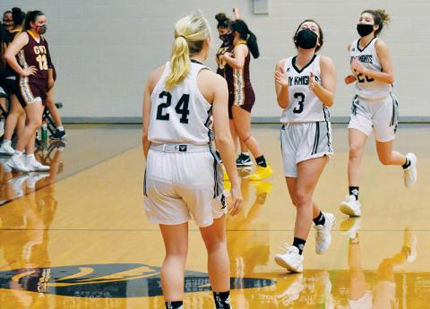 Though exhausted, Robbinsville’s Gabby Hooper (3) begins to applaud the Lady Knights’ effort after a 77-70, triple-overtime triumph over Cherokee Lady Braves. Greeting Hooper is Kensley Phillips; Yeika Jimenez (20) is not far behind beginning the celebration. Photos by Kevin Hensley/editor@grahamstar.com