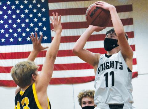 Robbinsville Middle School’s Bryce Adams puts up a floater during a home game with Murphy on Jan. 25. Adams dropped 30 points on the Swain County Maroon Devils in the Knights’ 68-62 road win on Jan. 27. Photo by Kevin Hensley/editor@grahamstar.com