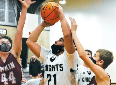 Amid heavy pressure from Swain County, Quinn Jumper eyes the bucket during a loss to the Maroon Devils on Feb. 11. Photos by Kevin Hensley/editor@grahamstar.com