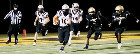 Senior Wade Hamilton takes off with one of four Robbinsville interceptions the Knights picked off in Friday’s win. Photos by Miranda Buchanan/Robbinsville High School Yearbook