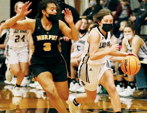 Robbinsville senior Gabby Hooper (right) looks to outpace Murphy’s Kaiya Pickens during Saturday’s third-round playoff matchup. Photo by Montana Buchanan/Robbinsville High School Yearbook
