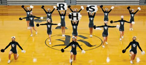 The Lady Knights’ varsity cheerleaders perform their virtual, state routine Sunday at Robbinsville High School. Photos by Kevin Hensley/editor@grahamstar.com