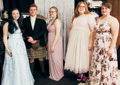 Isabella Hyde, Zeke Odom, Sabrina Orr, Cassie Sawyer and Christina Lancaster (from left) were able to re-create what should have been their 2020 prom group photo at Robbinsville High School’s Senior Sunrise Celebration on Wednesday, March 3. Photos by Charlie Benton/news@grahamstar.com