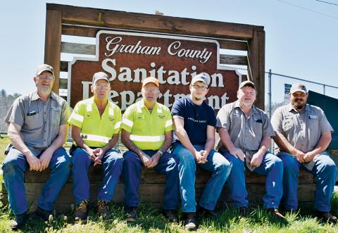 Members of the Graham County Sanitation Department make a living by cleaning up the county. From left are Harvey Bollinger, Richard Millsaps, Junior Shaffer, Chris Williams, Gavin Colvard and Scott Hooper. Not pictured are Samuel Shope, Bill Self and Myron Hidden. Photo by Art Miller/amiller@grahamstar.com