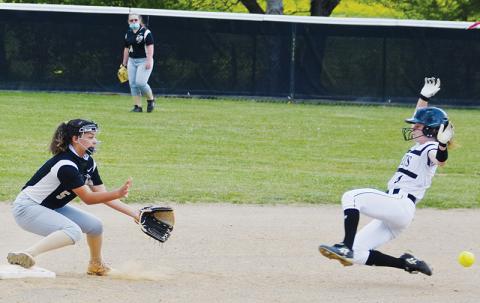 Aynsley Fink begins her slide into second base during the April 29 regular-season finale against Hayesville. Photo by Art Miller/amiller@grahamstar.com