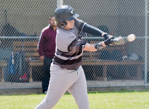 Avery Webster connects for an RBI single during the May 13 win over Cherokee. Photos by Kevin Hensley/sports@grahamstar.com