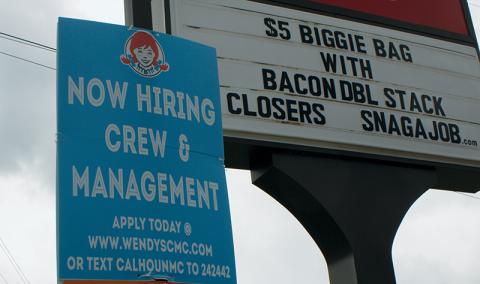 A sign at the Robbinsville Wendy’s restaurant advertises help wanted, as Graham County continues to have the highest unemployment numbers in the Southwestern region. Photo by Charlie Benton/news@grahamstar.com