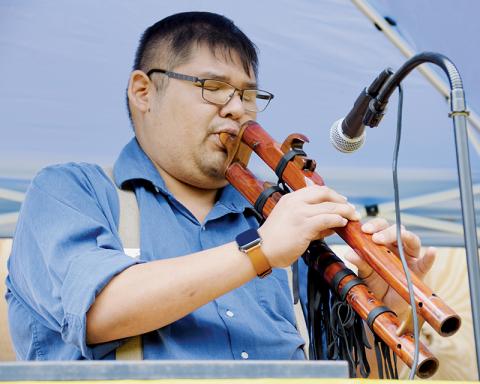 Matthew Tooni performs during a Cherokee flute demonstration at Saturday’s 35th Annual Fading Voices Demonstration Day in Snowbird. Photos by Art Miller/amiller@grahamstar.com