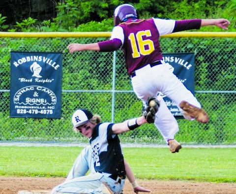 Cole Patterson makes sure that Cavan Reed’s clever attempt to avoid the tag is unsuccessful, during Tuesday’s home, regular-season finale against Cherokee. Photos by Art Miller/amiller@grahamstar.com