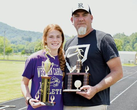 One family, two awards, 30 years apart: Zoie Shuler (left) was named the Most Outstanding Female Track and Field Athlete of the Smoky Mountain Conference championship meet June 9. Her father Michael received the distinction of Most Outstanding Male Field Athlete in both 1991 and 1992. Photos by Kevin Hensley/sports@grahamstar.com