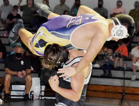 Kyle Fink has North Henderson’s Felix Montiel in a compromising position during the 195-pound bout of June 3’s “Battle of the Knights.” Fink would pin Montiel in the second period. Photos by Art Miller/amiller@grahamstar.com
