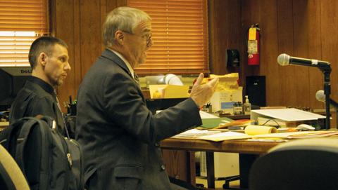 Attorney Michael Fox (left) cross-examines a witness in Graham County Superior Court on Tuesday, as his client – Casey Adam Haney – watches. Photo by Charlie Benton/news@grahamstar.com