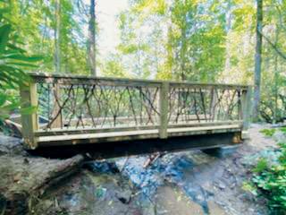Thanks to the quick work of the National Wild Turkey Federation and C&W Contracting, county residents and visitors now have a safer way to travel the 0.3-mile trail to Yellow Creek Falls. Photo courtesy of Cody Carpenter/Contributing Photographer