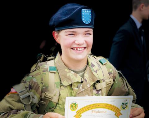 Robbinsville High School senior Ainslee Munro proudly displays her diploma from the U.S. Army Military Police School, after completing two months of National Guard basic training on Aug. 19.