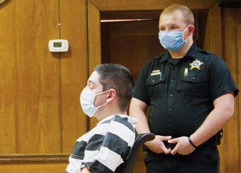 Christopher Nathaniel Rabb, 20, sits in Graham County District Court on Tuesday. Judge Kaleb Wingate granted a female victim who he allegedly assaulted and kidnapped a restraining order against him. Photos by Charlie Benton/news@grahamstar.com