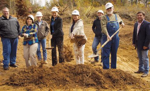 Soil flew through the air as ground was broken on the Rural Development Authority Moose Branch Subdivision Project Tuesday morning. Photo by Charlie Benton/news@grahamstar.com