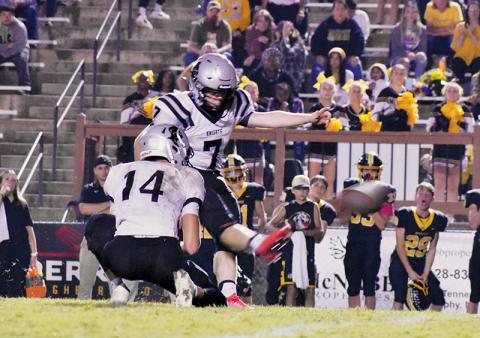Black Knights senior Cody Cline connects for the game-winning, 42-yard field goal Friday at Murphy. The kick sealed a 23-20 victory for Robbinsville. Photos by Kevin Hensley/sports@grahamstar.com