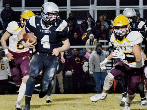 Cuttler Adams evades the pursuit of two Cherokee defenders during Friday’s second-round playoff victory over the Braves. Adams had four rushing touchdowns in the game. Photos by Art Miller/amiller@grahamstar.com