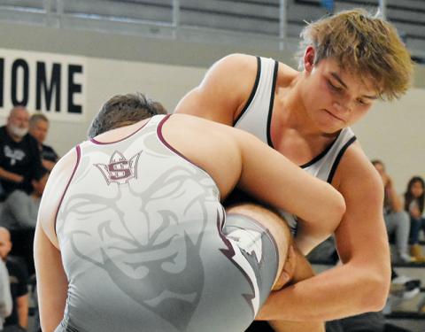 Two-time defending 195-pound 1A state champion Kyle Fink prepares for a takedown during Saturday’s  inaugural “Nothing but Neutral” tournament at  Robbinsville High School. Photos by Kevin Hensley/sports@grahamstar.com