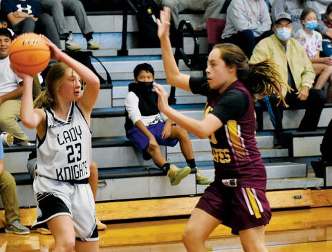 Abby Wehr searches for an open option during Monday’s season opener against Cherokee. Photos by Kevin Hensley/sports@grahamstar.com