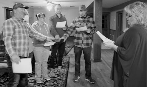 The Town of Fontana Dam council was sworn in during its Dec. 15 meeting. From left are mayor Rob Hardy, councilwoman Tiffany Duke, councilwoman Lacie McBee, councilman Jon Hodgson, councilman Brandon Jones; and at right is Town Clerk Zelerie Rogers. Photo by Charlie Benton/news@grahamstar.com