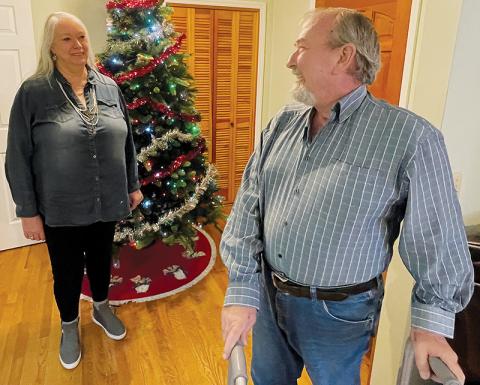 Michelle Shiplet, left, helped her husband Matt during his almost four-month struggle to survive COVID-19. He missed Thanksgiving, but was home in time for Christmas at their Sweetwater home. Photo by Randy Foster/news@grahamstar.com