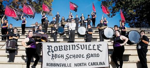 The Black Knight Band is finishing its first marching season under the leadership of alumna Amber Watkins. Photo courtesy of Maria Shook Photography